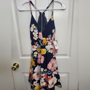NWT Floral dress. Lace open back.